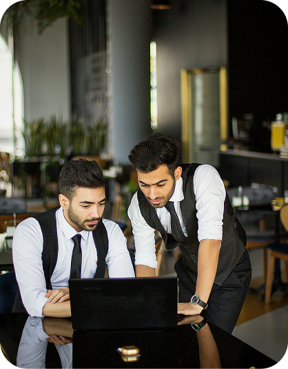 Compliance Specialists Working on Laptop